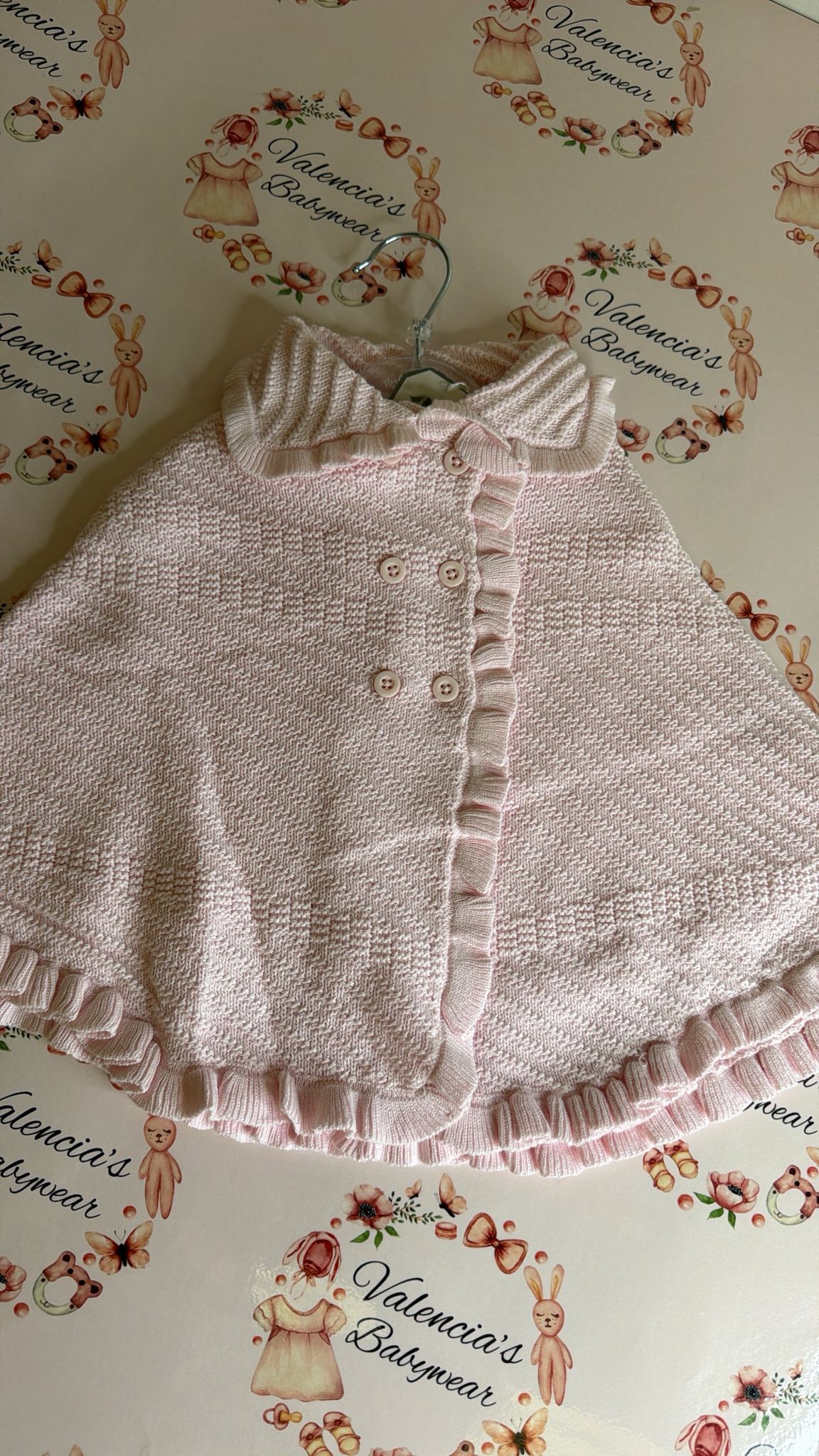 Pink knitted shawl