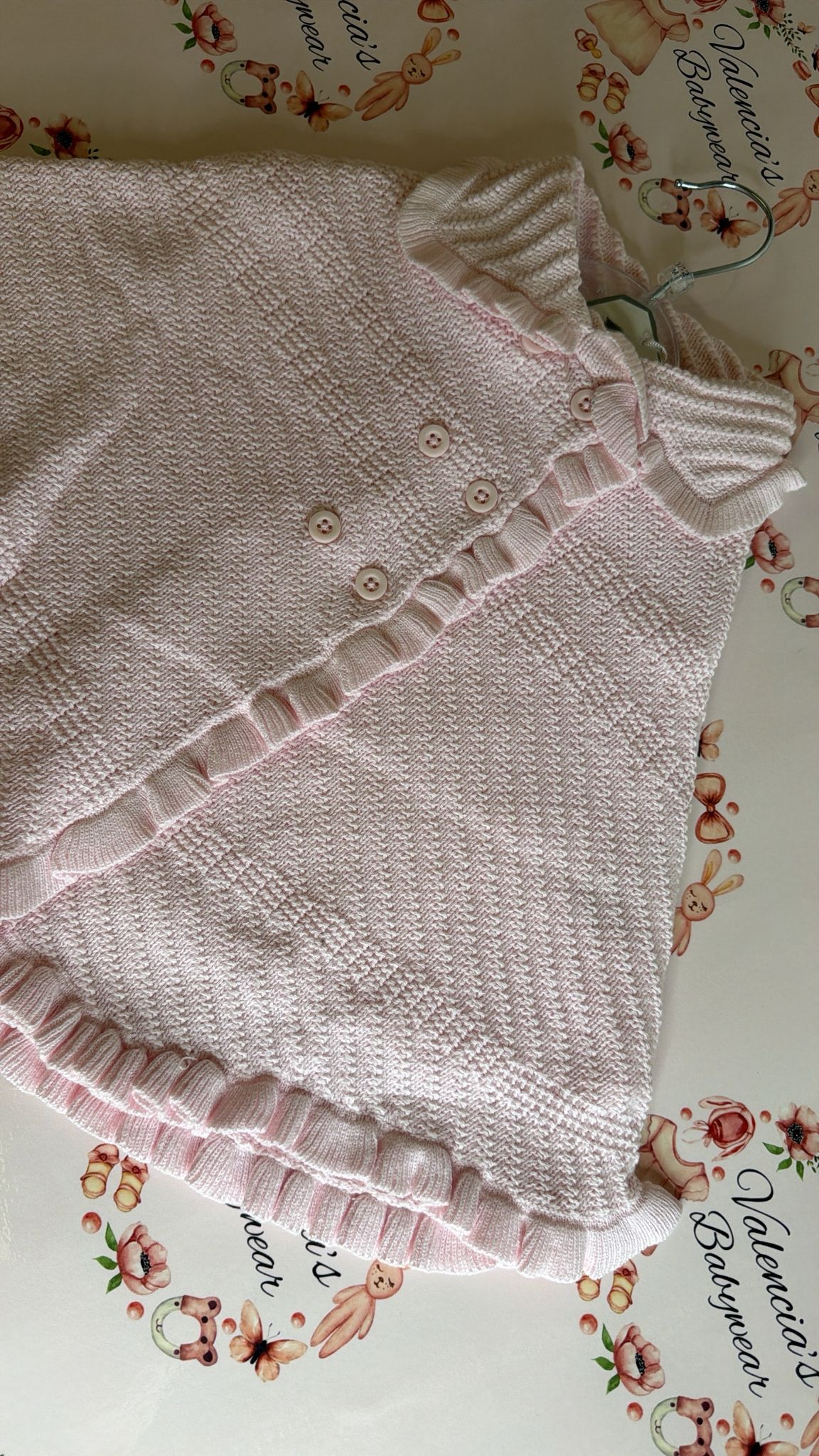 Pink knitted shawl