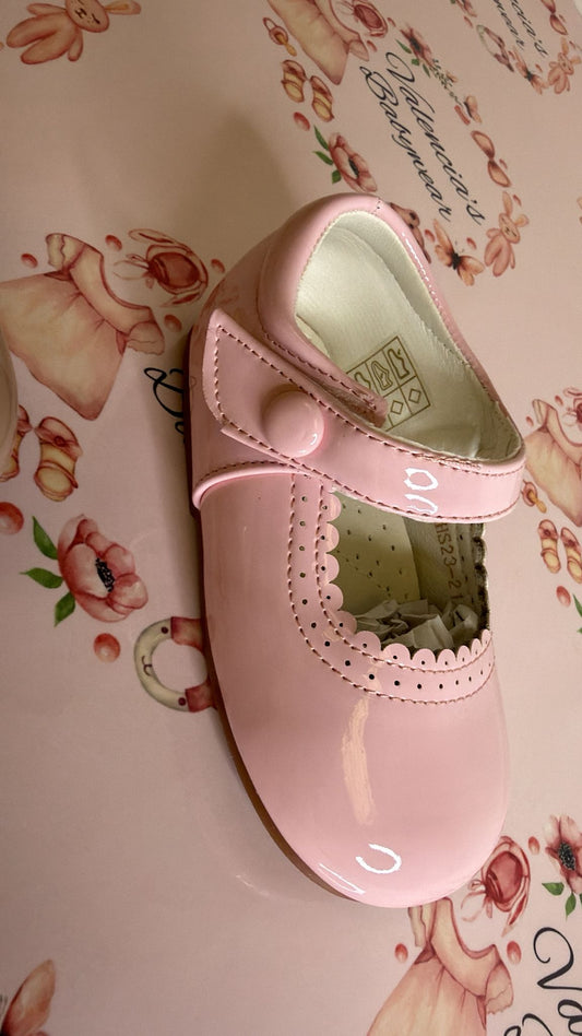 Pink patent shoes