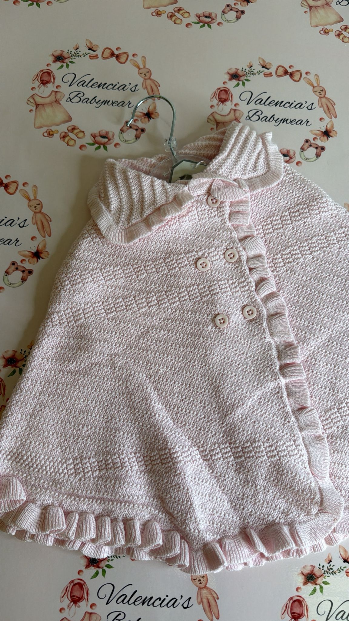 Pink knitted shawl